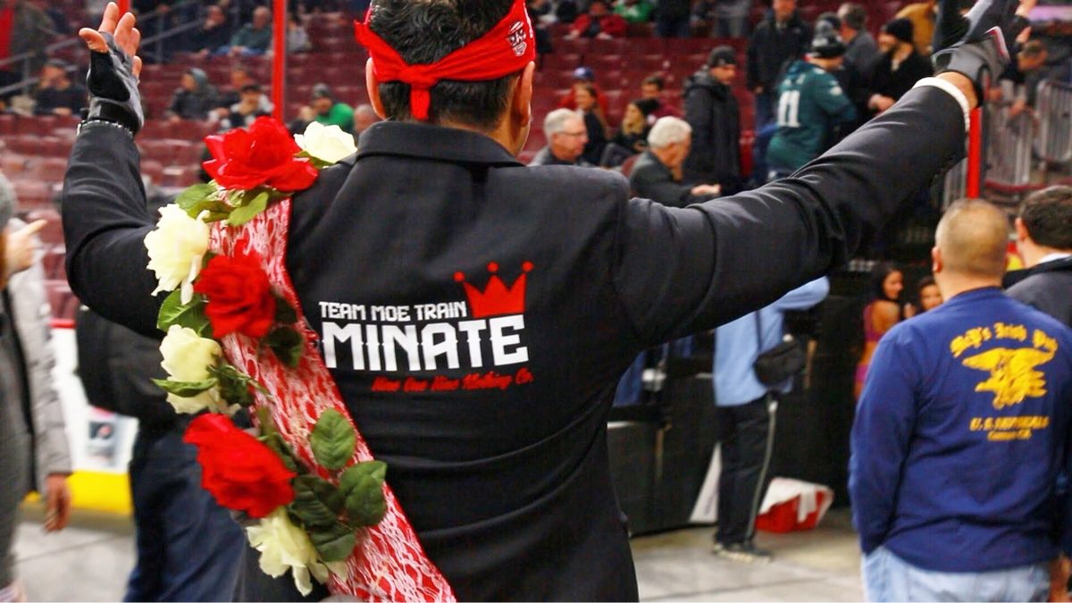 Back of Moe's Team Moe Train jacket as he faces the Wing Bowl crowd