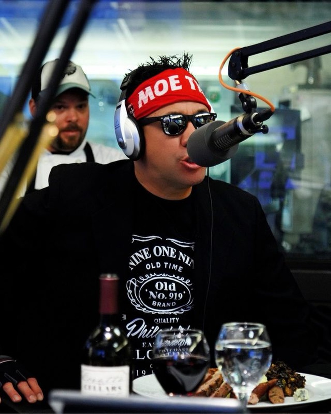 Moe Train on the radio, mic live